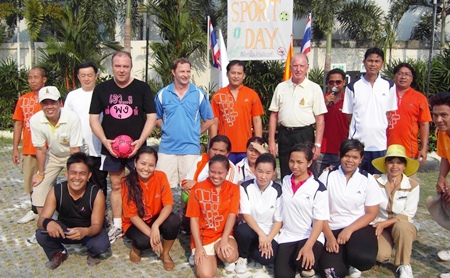 The Thai Garden Resort management players prepare to take on the female staff team at football.